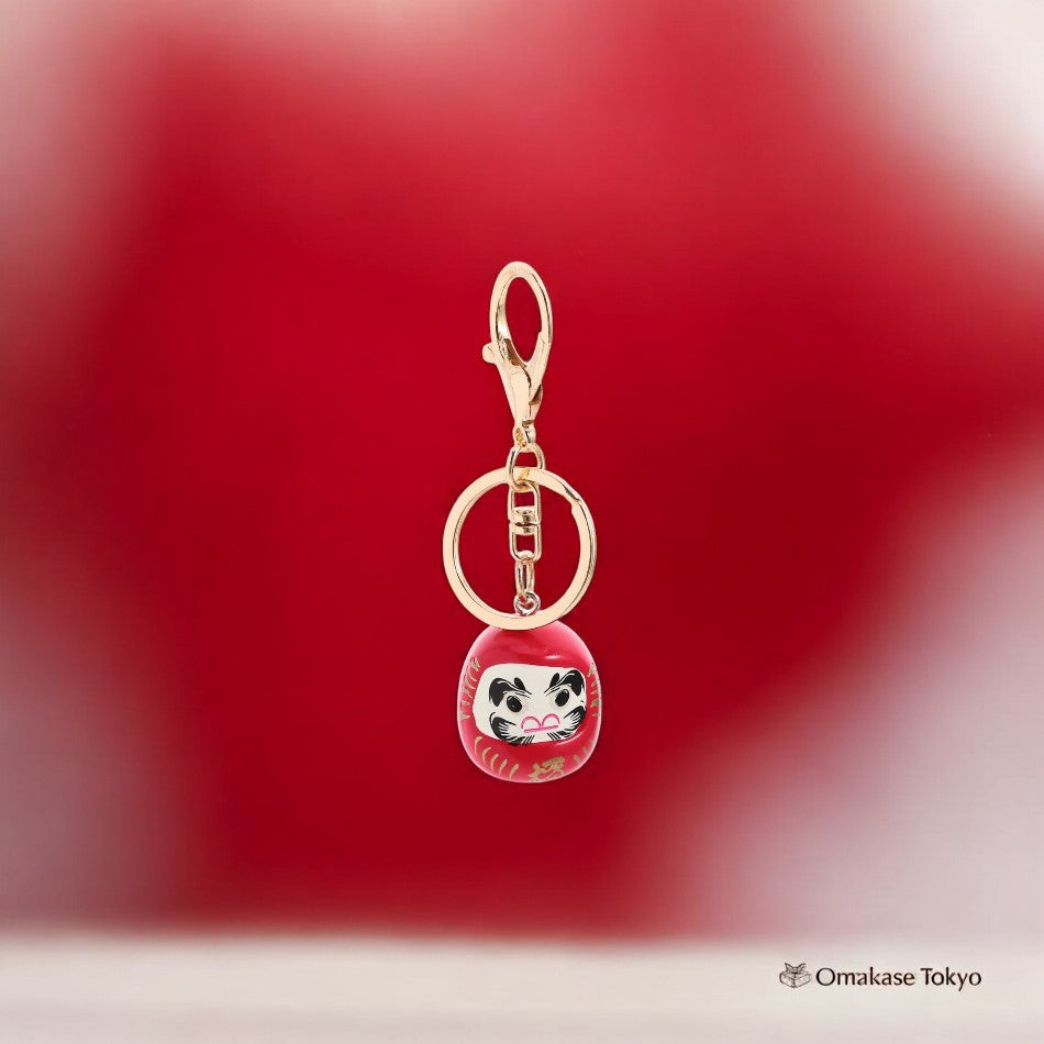 Porte-clés LIFKOME Mini Daruma – Or et rouge